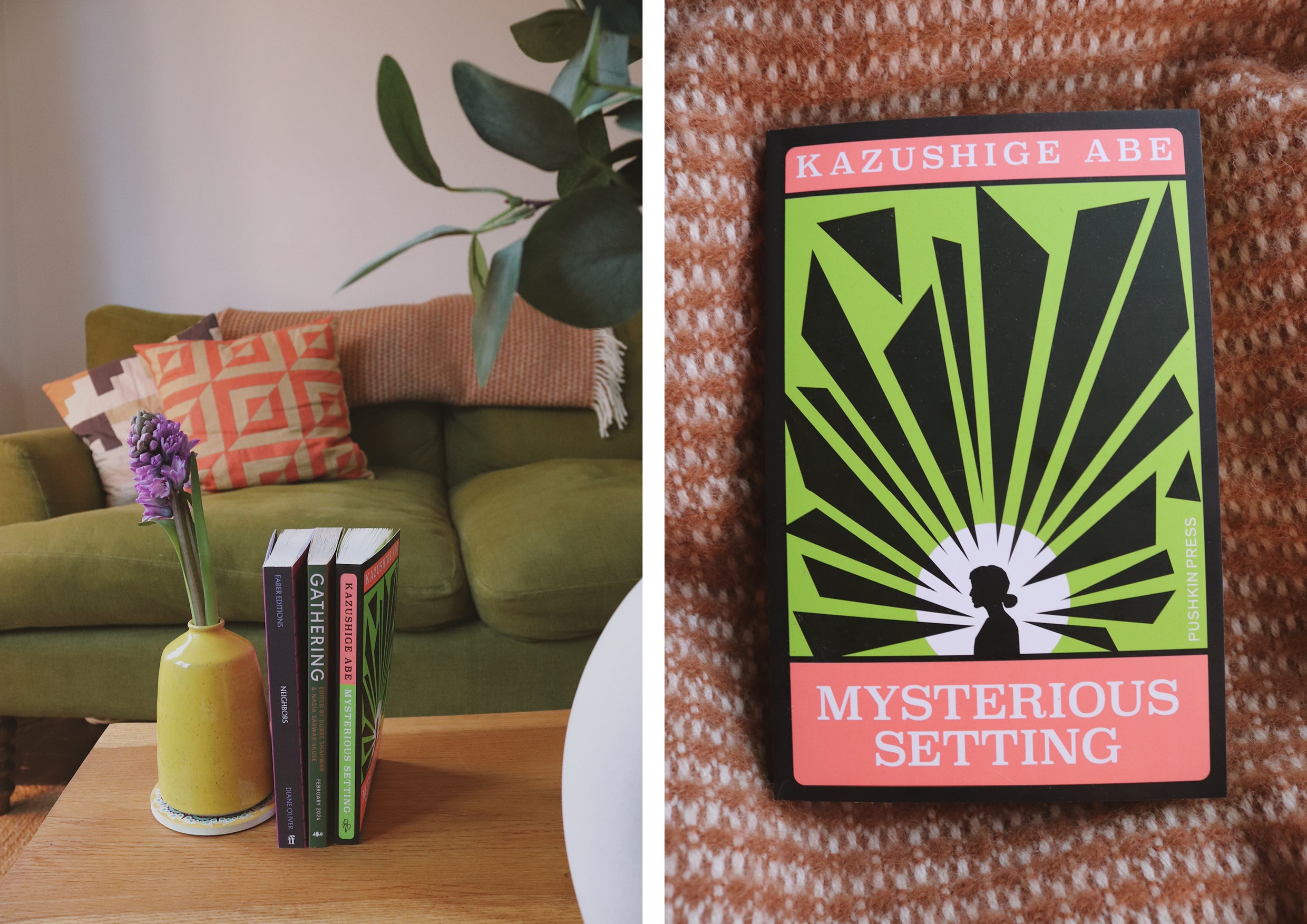 A vase and books on a coffee table