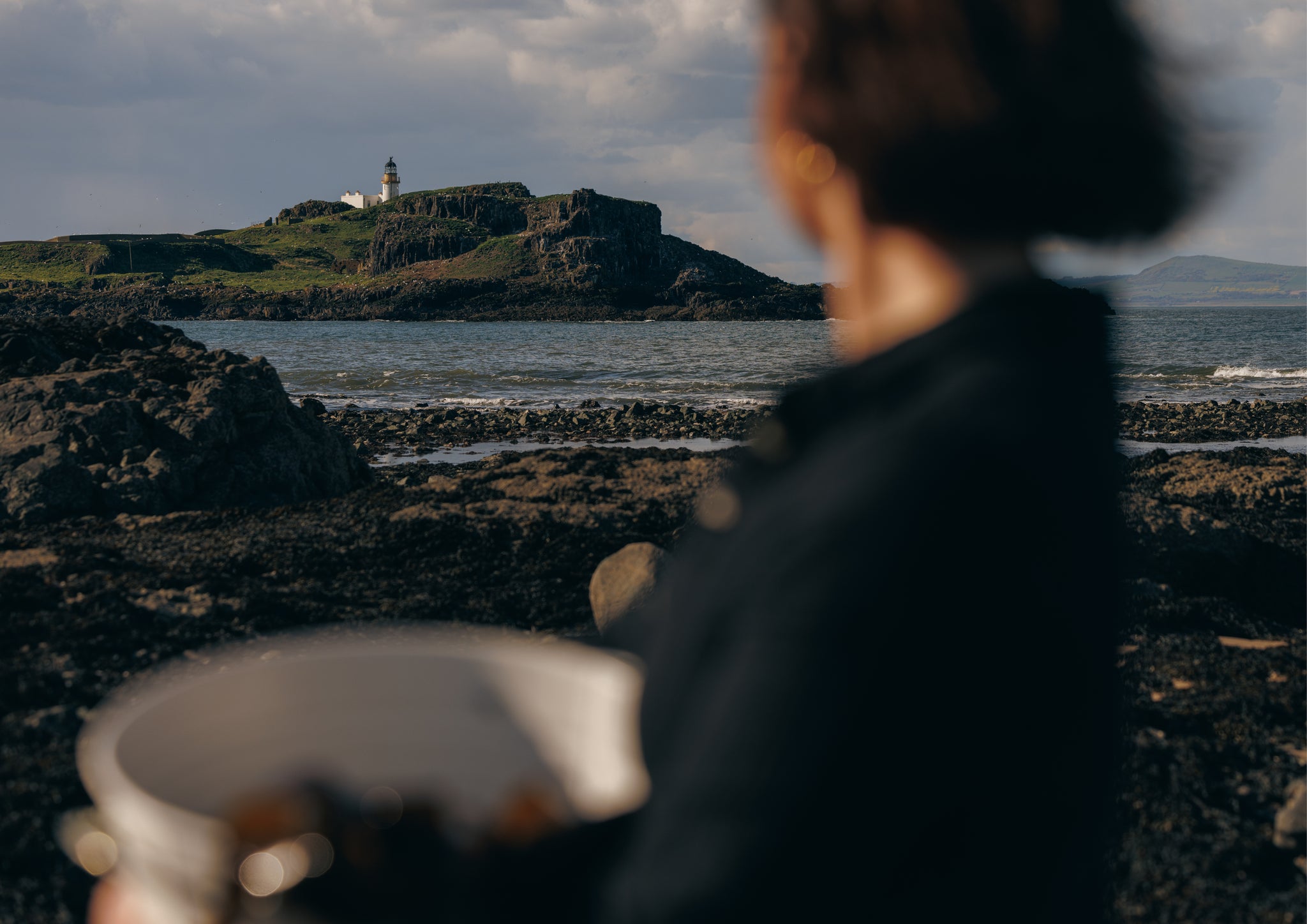 Woman by the coast